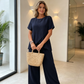 💃 Costum feminin bluză asimetrică + pantaloni largi, lejer și confortabil, stil elegant fără efort