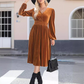 Rochie elegantă cu talie înaltă și croi în A, cu smocuri