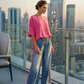 Set cu top roz vibrant și pantaloni cu imprimeu leopard îndrăzneț