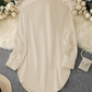 💎 50% REDUCERE! 💎 Bluză cu mâneci lungi pentru femei, cu tiv asimetric – croială elegantă cu nasturi, fante laterale și țesătură moale de calitate superioară 👚✨