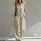 Salopetă fără mâneci, cu decolteu în V și croi larg, pentru femei