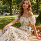 Rochie maxi cu umerii goi și decupaj floral