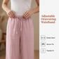 Pantaloni casual, cu croială largă și șnur, prevăzuți cu buzunare