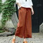 Pantaloni casual, cu croială largă și șnur, prevăzuți cu buzunare