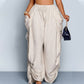 👖 ACUM CU 30% REDUCERE! 🏮 Pantaloni tip lanternă, lejeri pentru femei, cu șnur – moi și vaporoși – țesătură respirabilă, manșete elastice – perfecți pentru vară, plajă sau look-uri boho-chic 🌸