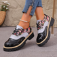 Damesbrogues met bloemenprint en plateauzool