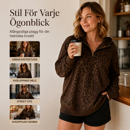 Damtröja med leopardmönster och kvartsdragkedja