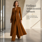 Kvinnlig elegant höst-outfit i två delar med retro långärmad kavaj och enkla byxor