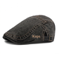 🧢 Neutralt utformad beret i vintage-stil med sliten look, i flatkepsstil