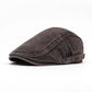 🧢 Neutralt utformad beret i vintage-stil med sliten look, i flatkepsstil